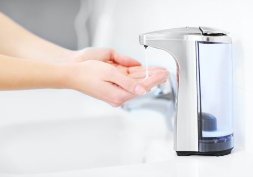 Hands and automatic soap dispenser